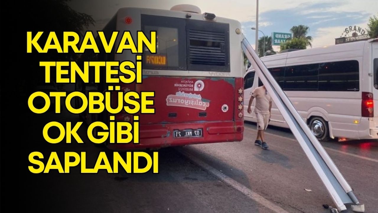 Antalya’da ilginç kaza! Karavan tentesi otobüse ok gibi saplandı