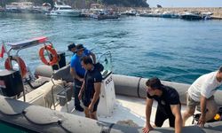 Antalya falezlerde seferberlik! Kurtarılan köpek polise böyle teşekkür etti