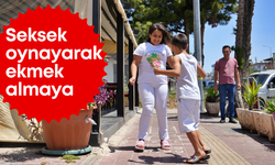 Antalya’da fırıncıdan eğlenceli dokunuş: Sek sek oynayarak ekmek almaya