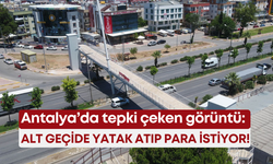 Antalya’da tepki çeken görüntü: Alt geçide yatak atıp para istiyor!