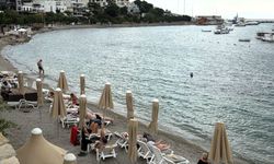 Muğla’da sağanak yağışa rağmen denize akın ettiler