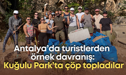 Antalya’da turistlerden örnek davranış: Kuğulu Park’ta çöp topladılar