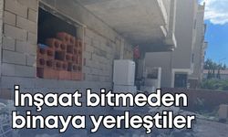 İnşaat bitmeden binaya yerleştiler!