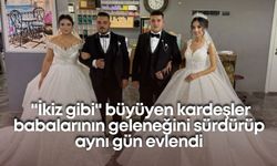 "İkiz gibi" büyüyen kardeşler babalarının geleneğini sürdürüp aynı gün evlendi
