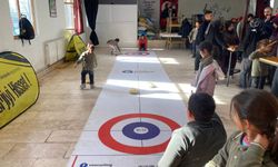 Korkutelililer curling oynadı