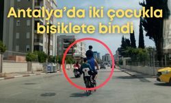 Antalya’da tepki çeken görüntü: İki çocukla bisiklete bindi