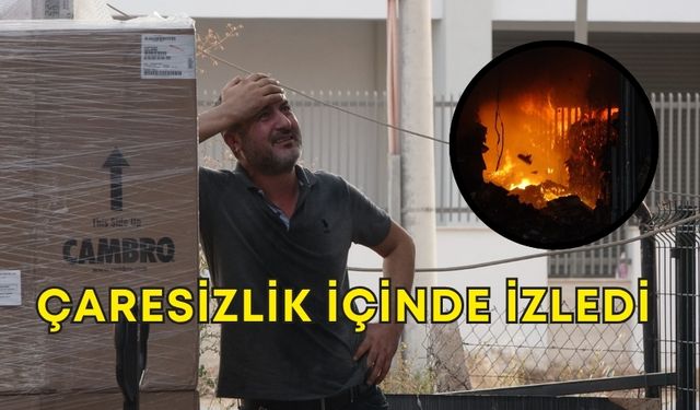 Kepez’deki işyerinin yanışını çaresizlikle izledi