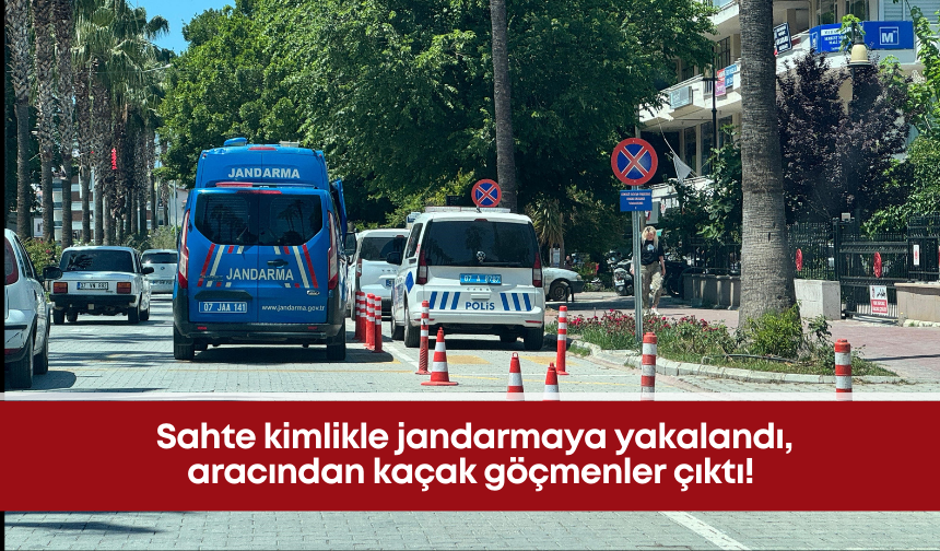 Sahte kimlikle jandarmaya yakalandı, aracından kaçak göçmenler çıktı!
